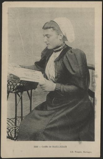 Maillezais. - Une jeune femme, en costume et coiffe, assise de profil et regardant un album.